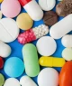 Pilha de comprimidos - antecedentes médicos; farmaceuticas; remedios